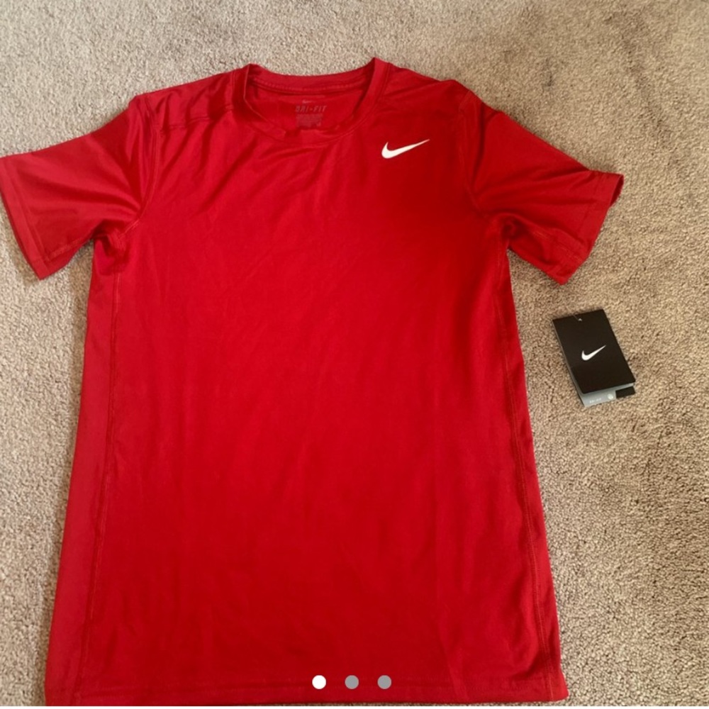 red Nike Dri-Fit shirt